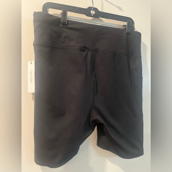 Calvin Klein Women's Black Athletic Shorts with White Logo - Picture 3 of 6